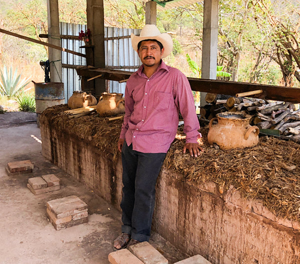 _<h2>Angel Cruz Robles and his clay stills</h2><p>Robles prefers ancestral methods. Clay stills impart a smooth colloidal softness, matching the intensity of wild agaves.</p>