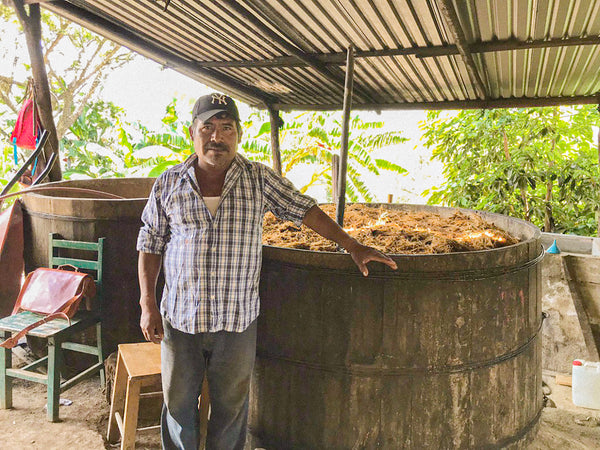_<h2>Serafin with one of his pair of fermenting tanks</h2><p>Serafin makes only small batches: this one is only 132 bottles. The focus shows up: clean distict flavors/aromas. Beautifully distilled.</p>